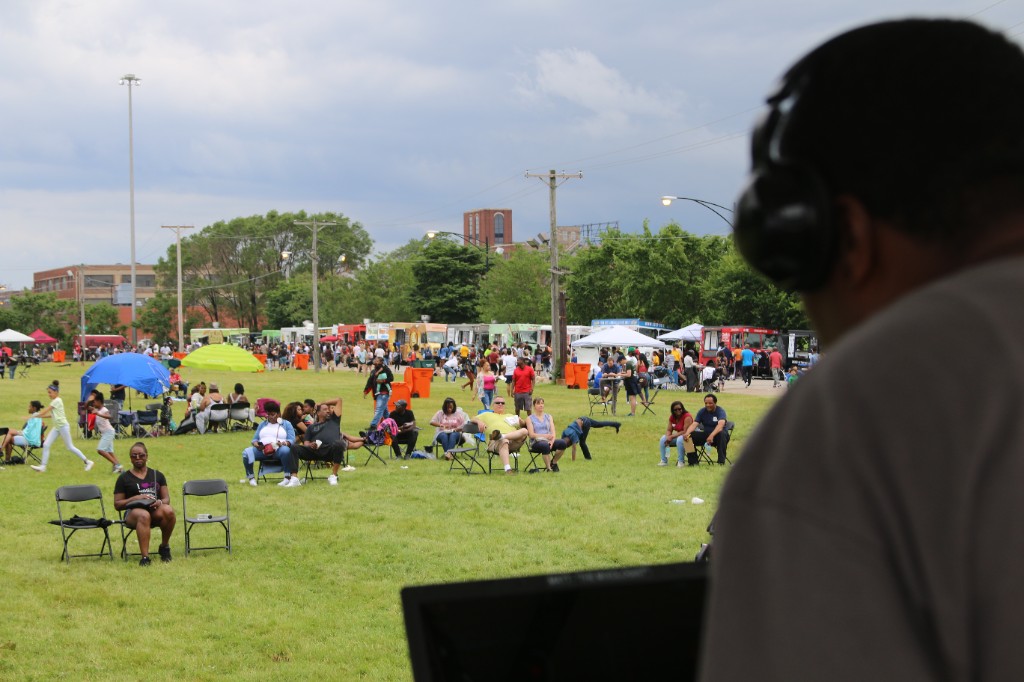 Lawn, food trucks, and DJ area at the South Loop summer festival