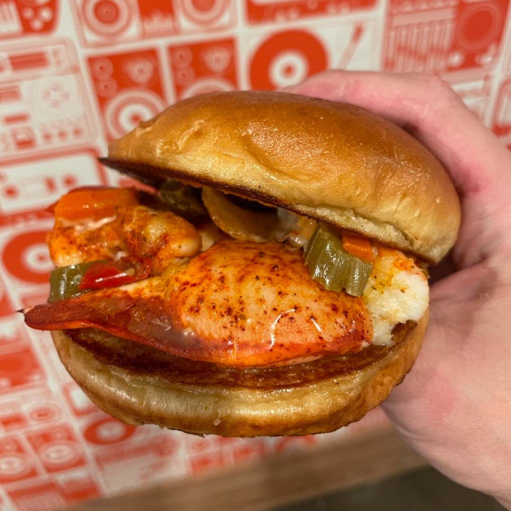 Happy Lobster — buttery lobster roll piled with fresh lobster on a toasted brioche bun