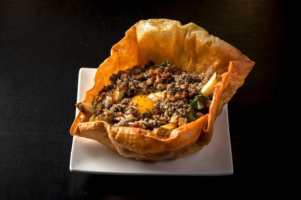 Whadda Jerk — Caribbean jerk-seasoned dish served in a crispy fried wonton bowl